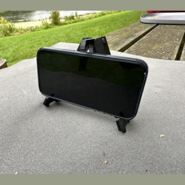 Show details for Caveman TV Smartphone Holder | Adotec Gear Picture of Caveman TV Smartphone Holder | Adotec Gear